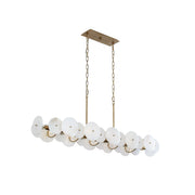 Selene Linear Alabaster Chandelier in a modern dining room setting.