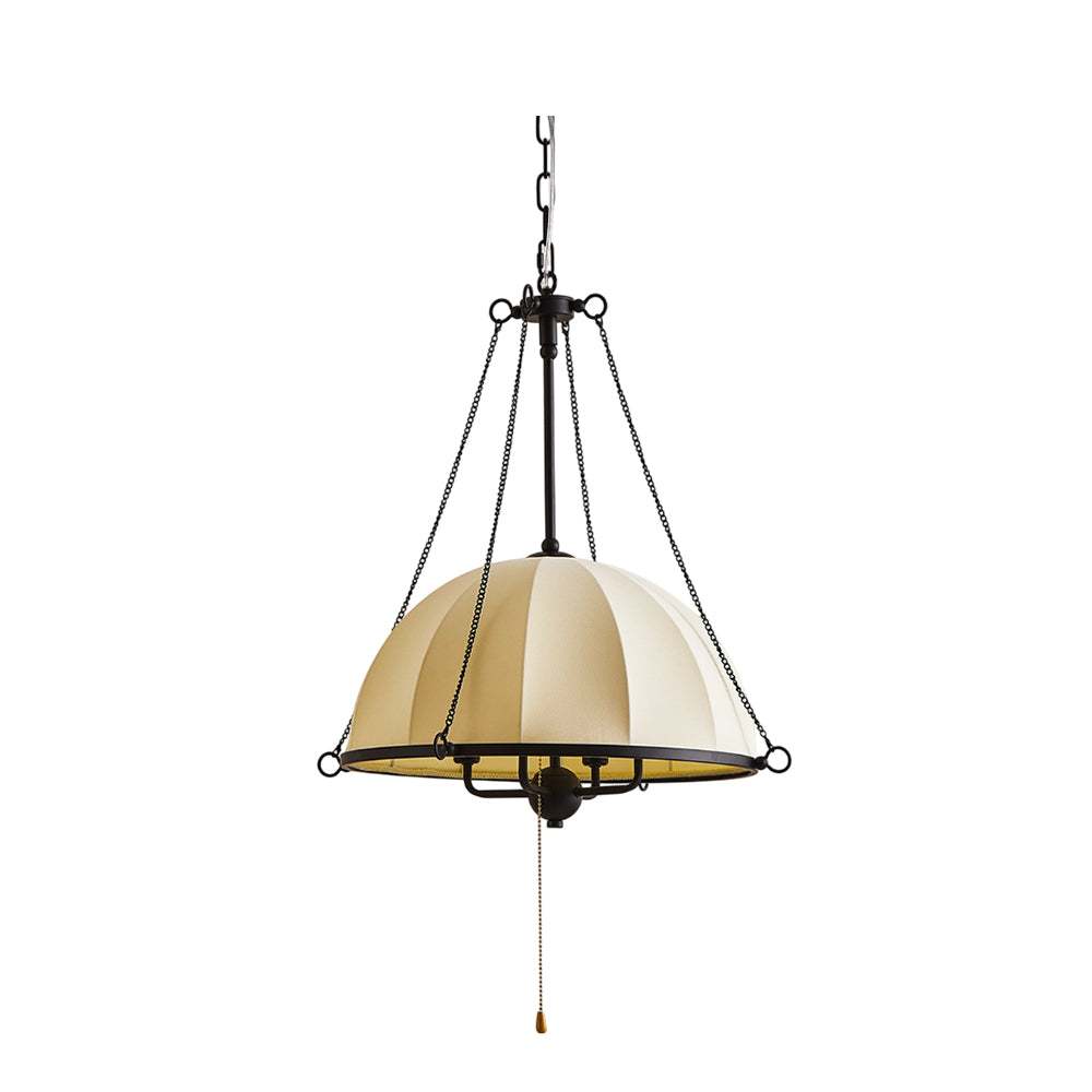 Covina Pendant Lamp with fabric shade in a living room setting.
