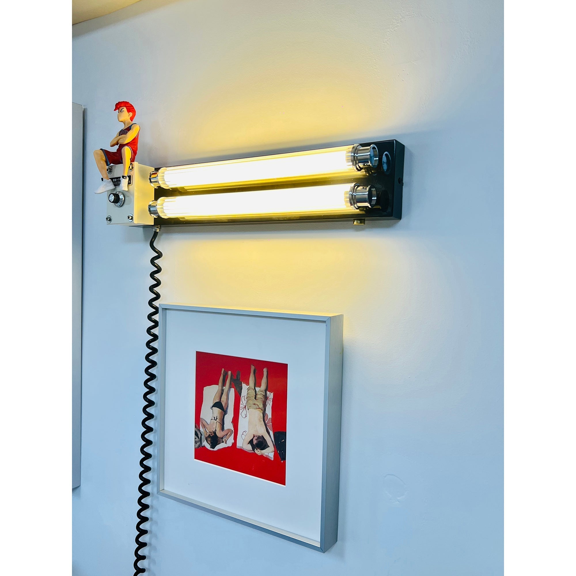 Size comparison of the different Cutshall Wall Lamp models.