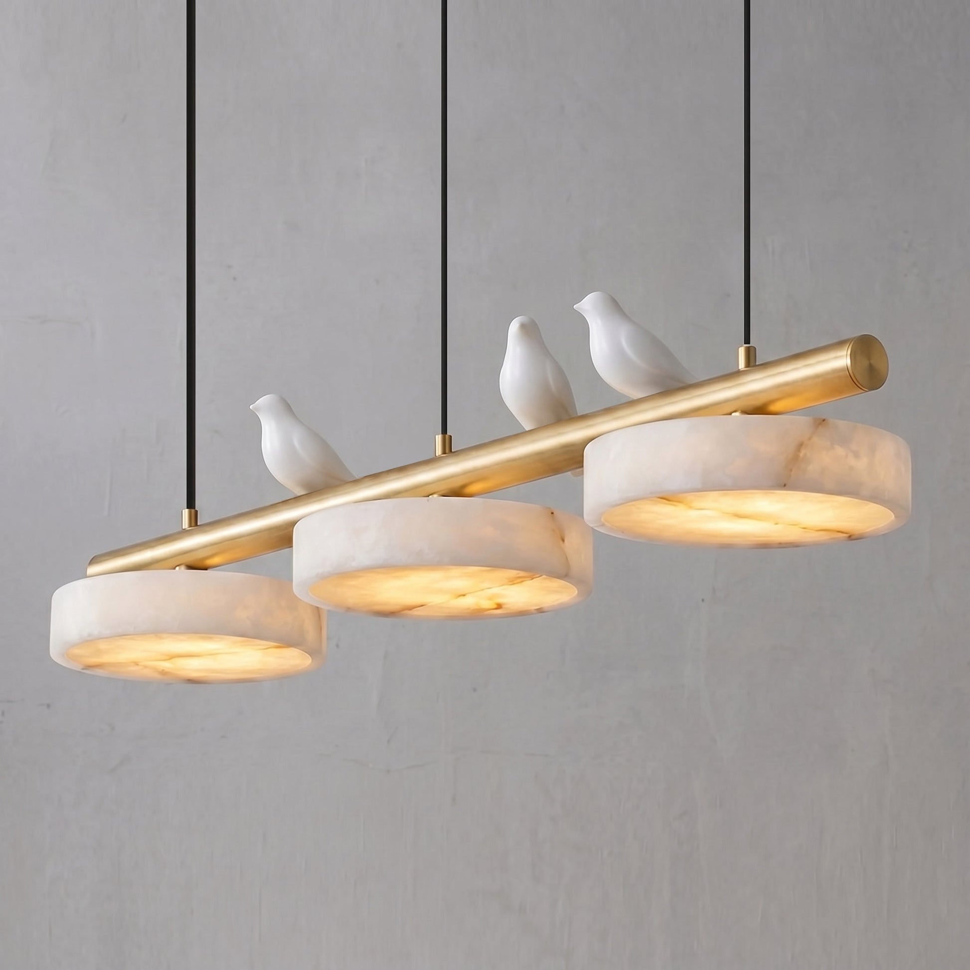 Angled view of the Sienna Bird Alabaster Chandelier, showing its linear form.