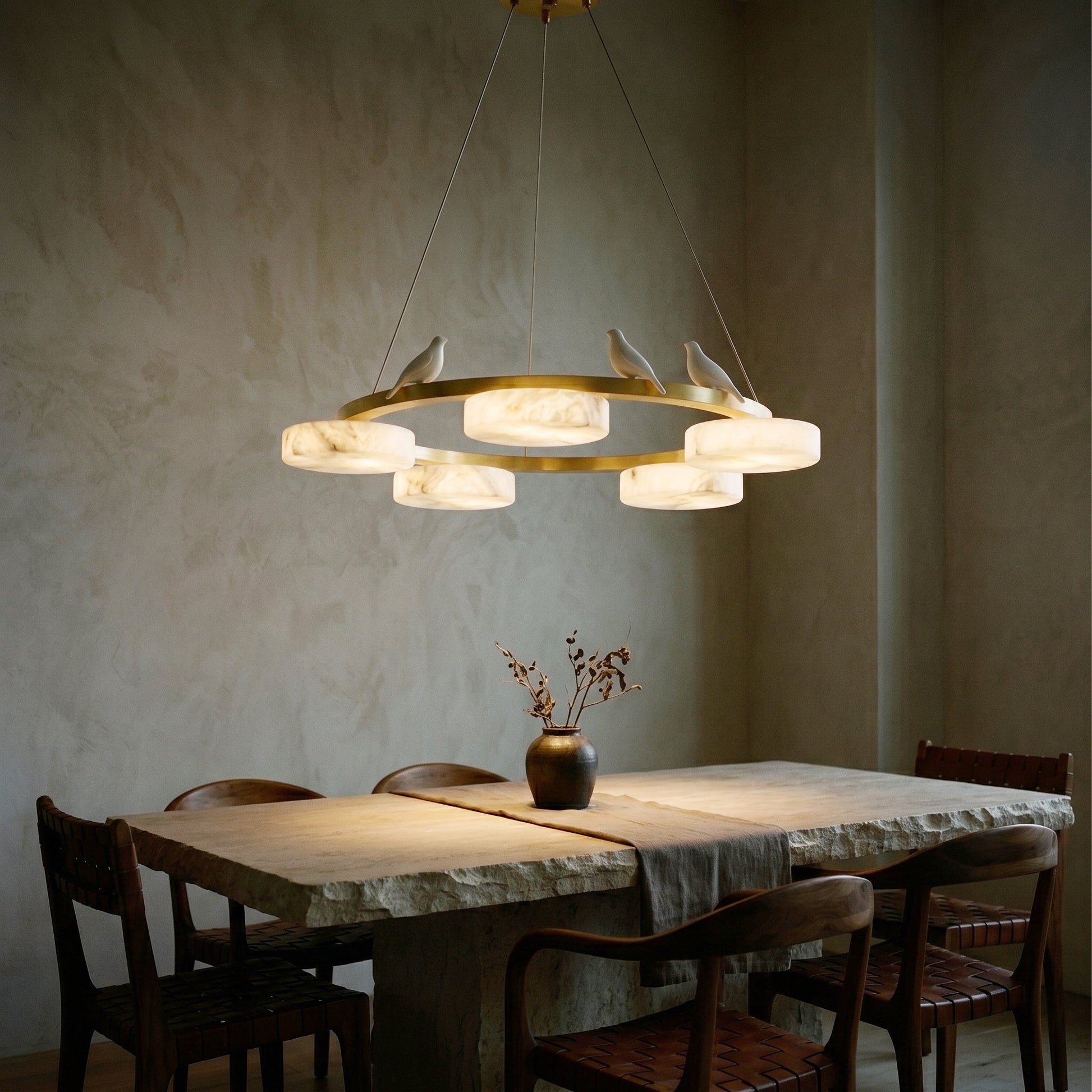Side profile of the Sienna chandelier, showing its height and bird details.