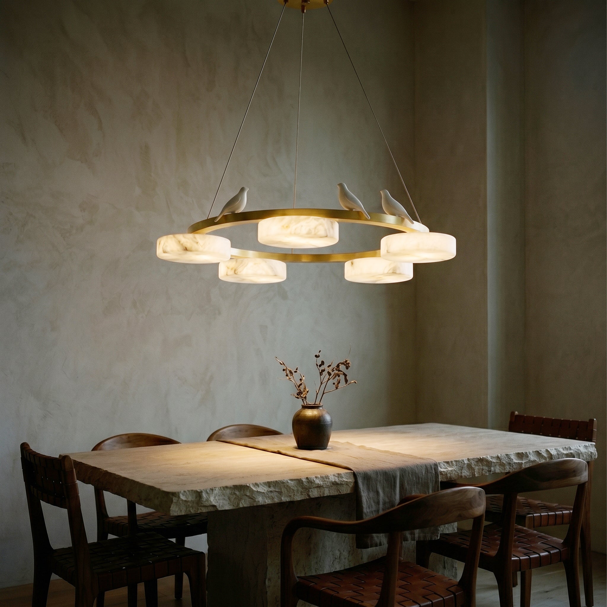 Side profile of the Sienna chandelier, showing its height and bird details.