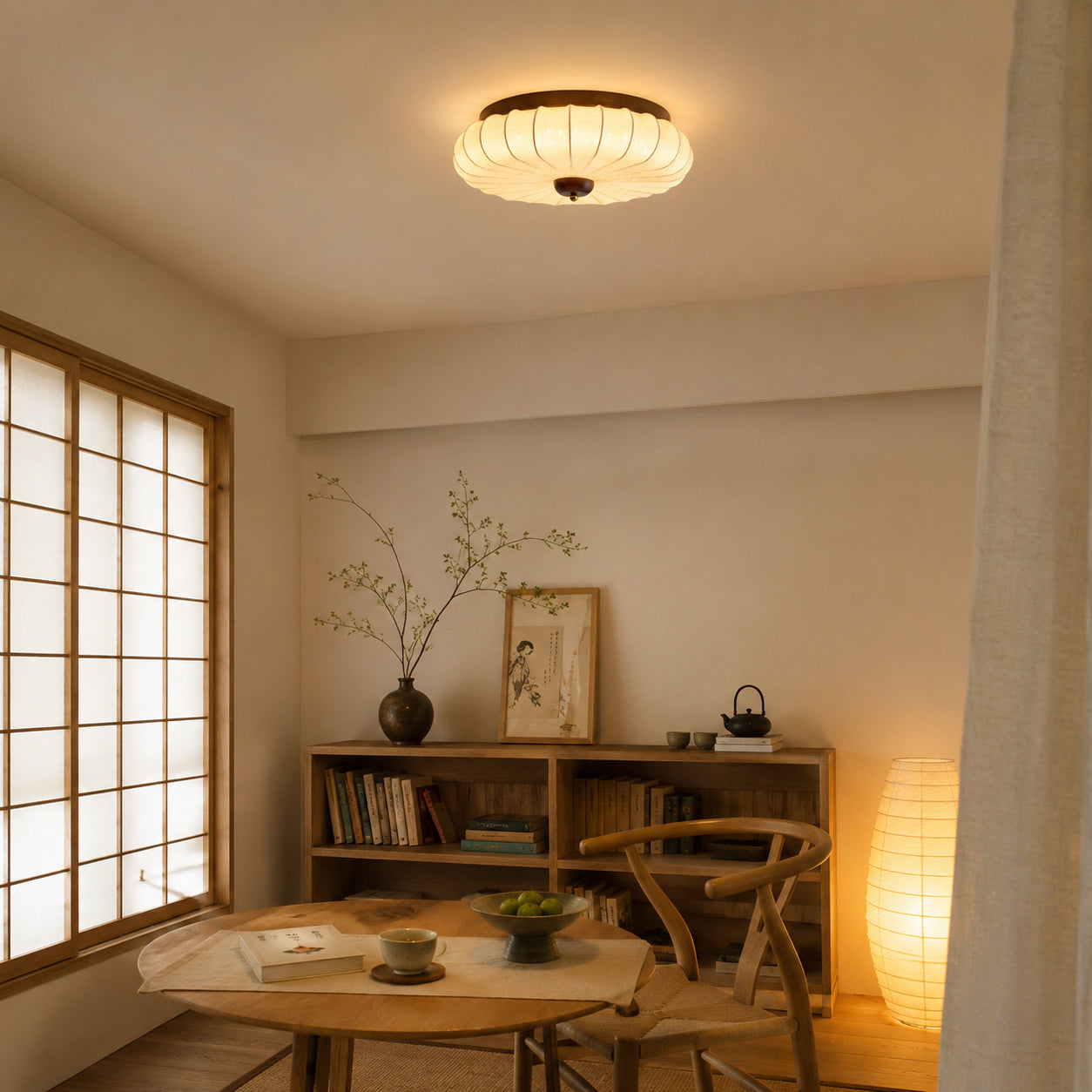 The flush mount light turned on, showing a warm ambient glow.
