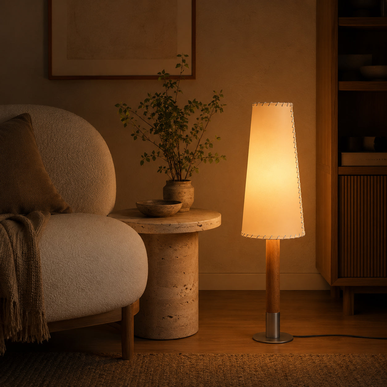 Close-up of the push-button switch on the lamp's cord.