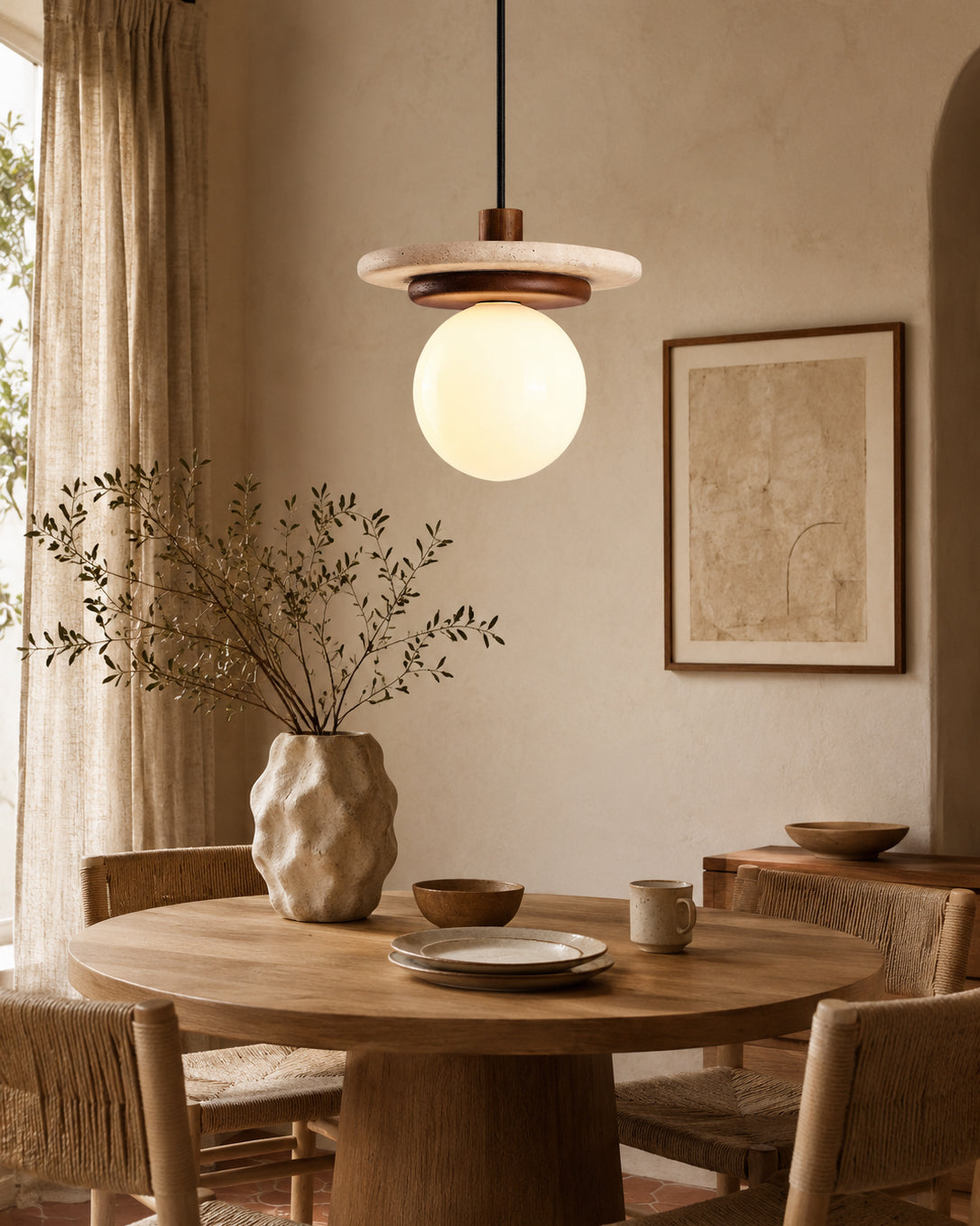 A single Farren pendant light hanging as a contemporary bedside lamp.