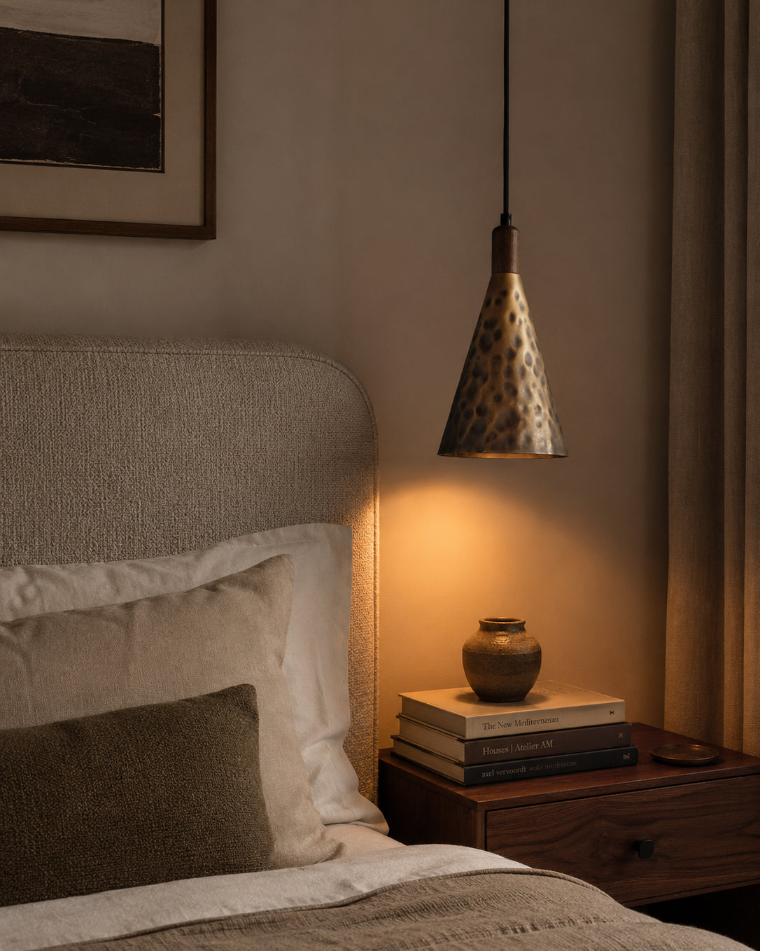 The Boyd Pendant Lamp used as an accent light in a cozy reading nook.