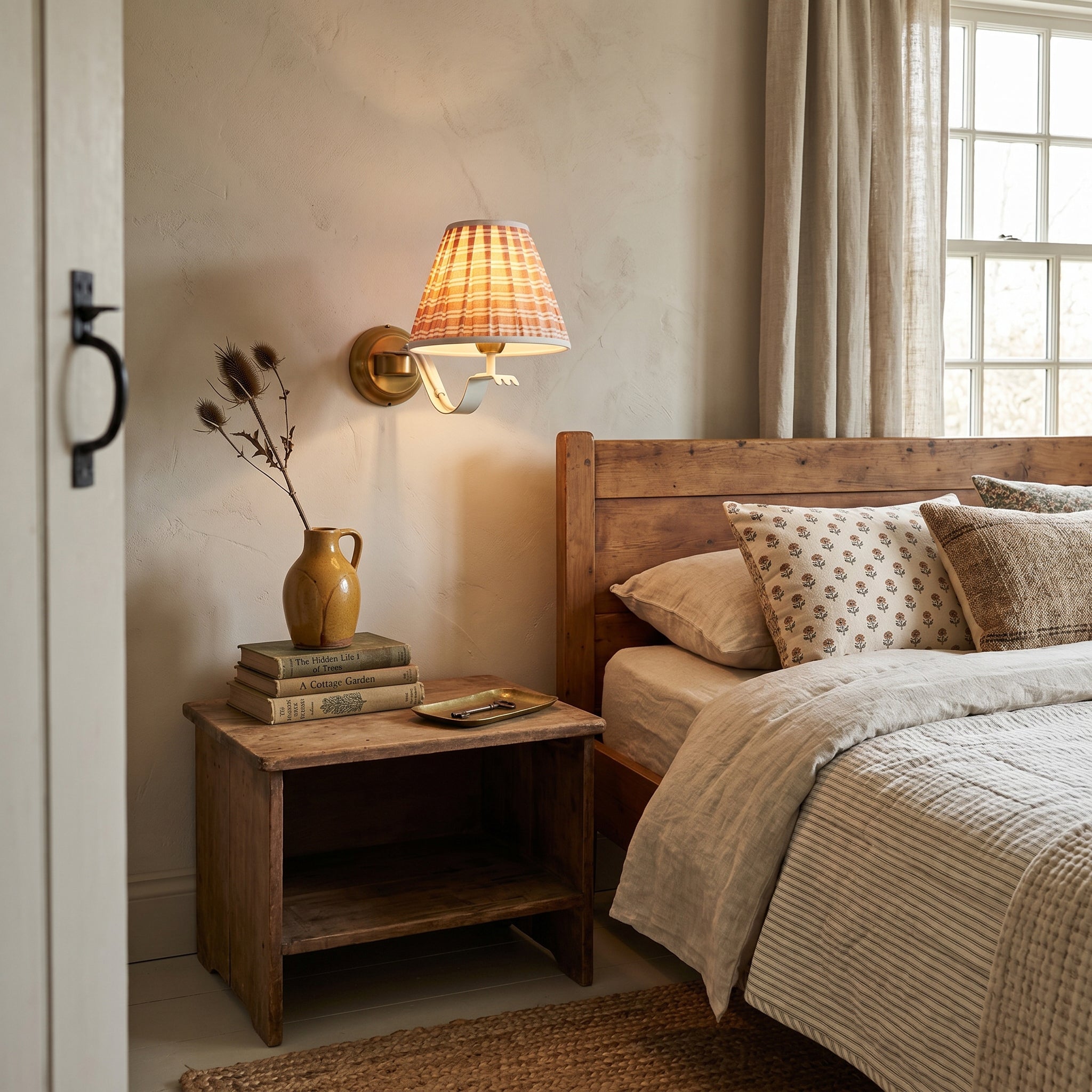 Angled view of the Penelope Pleated Wall Sconce.