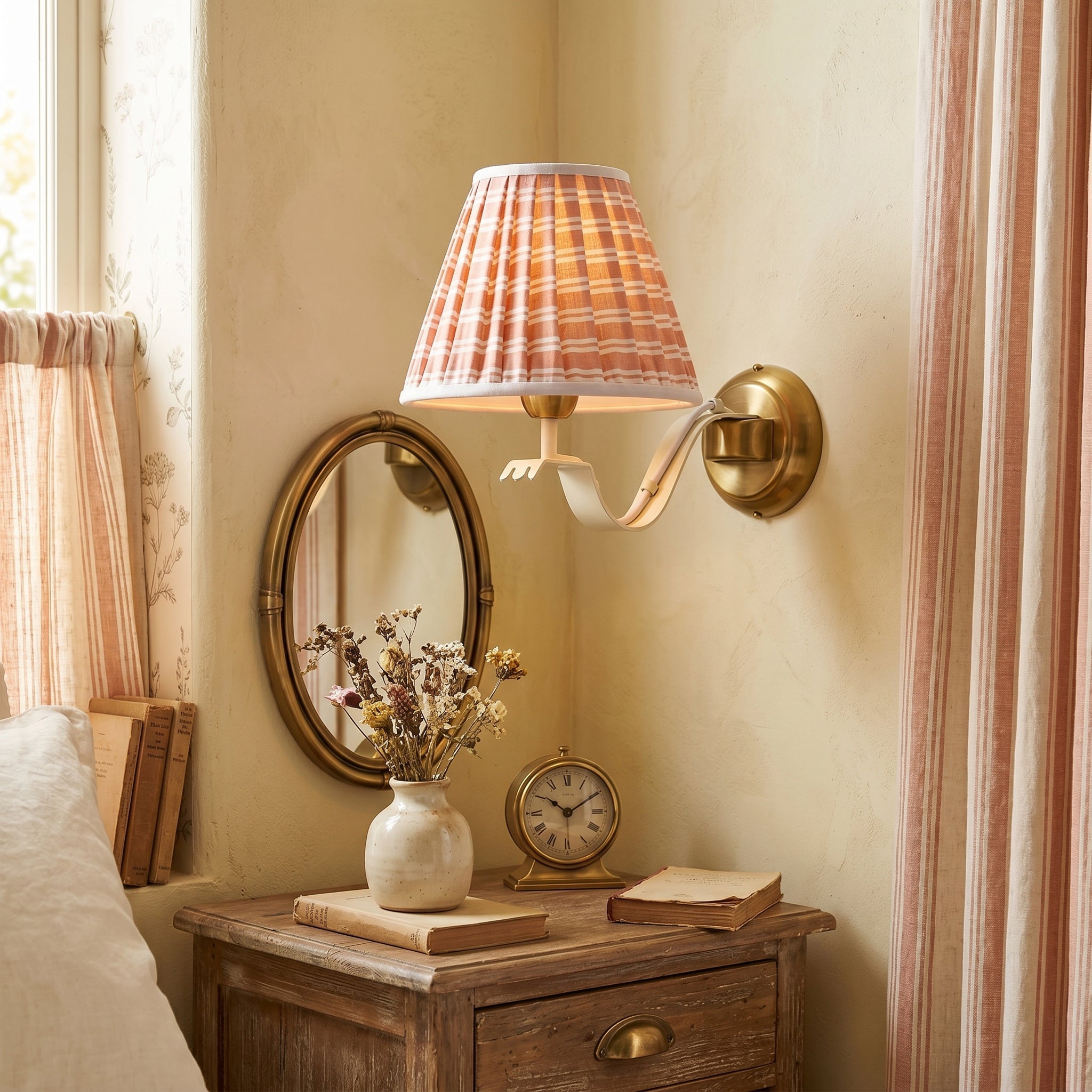 Close-up of the pleated fabric shade on the Penelope sconce.