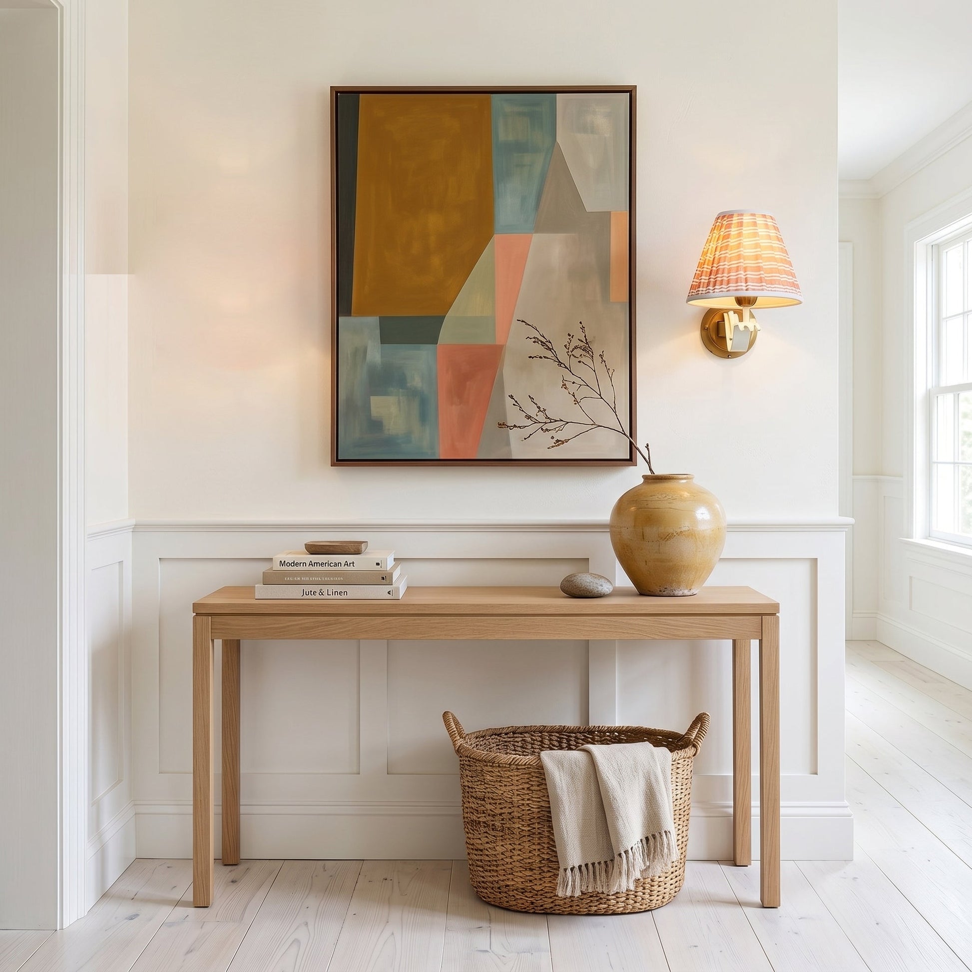 The wall sconce illuminating a cozy reading nook.