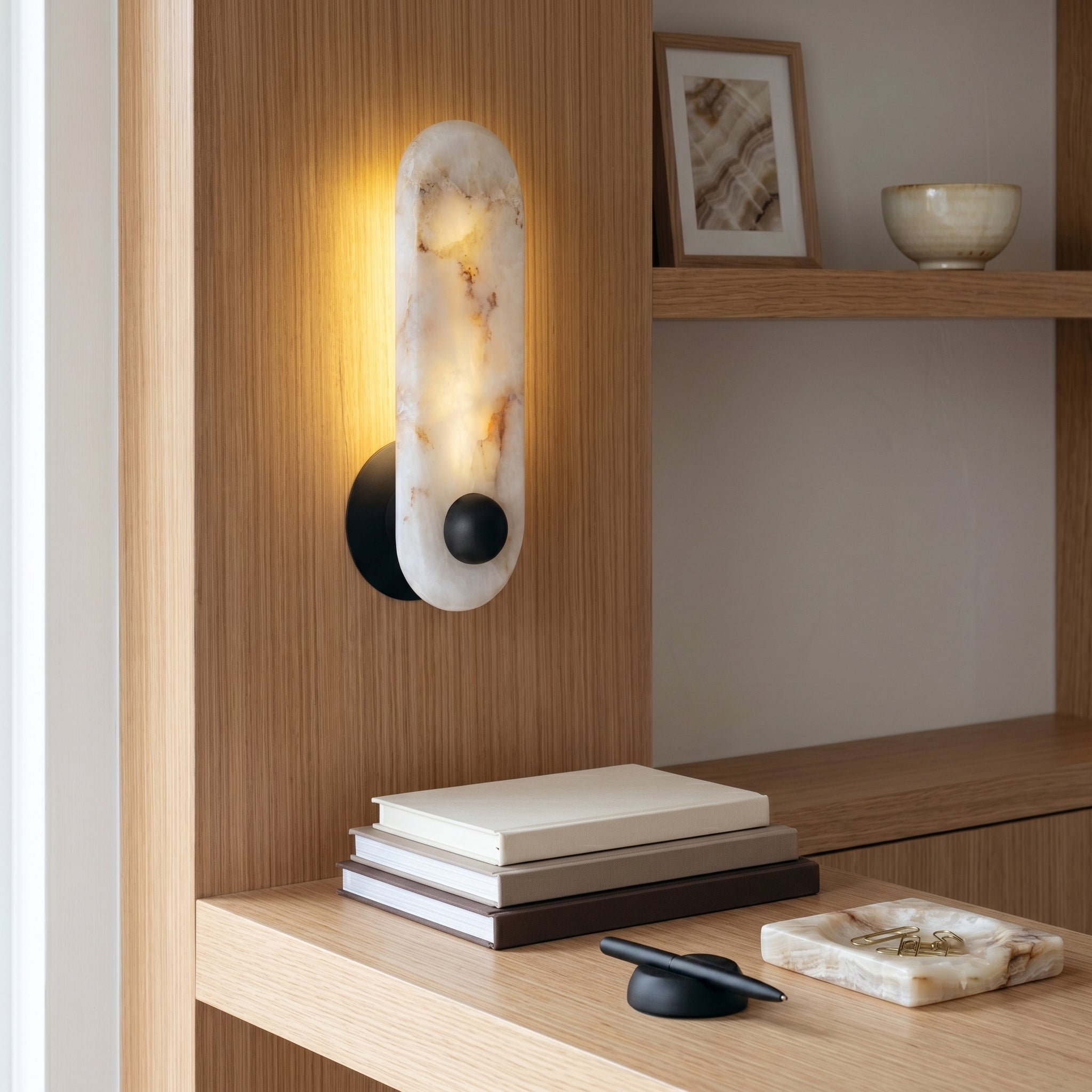 Close-up view of the Breuer Alabaster Wall Sconce, highlighting the natural stone veins.