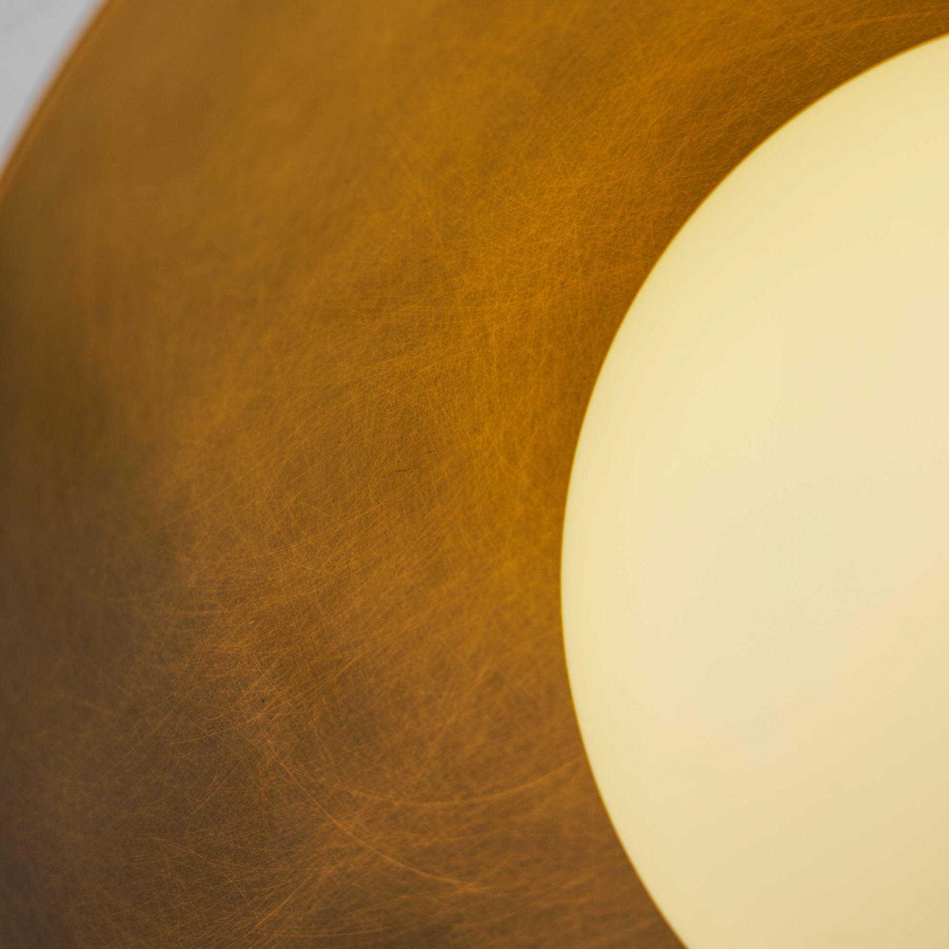 Close-up of the brass finish aging naturally.