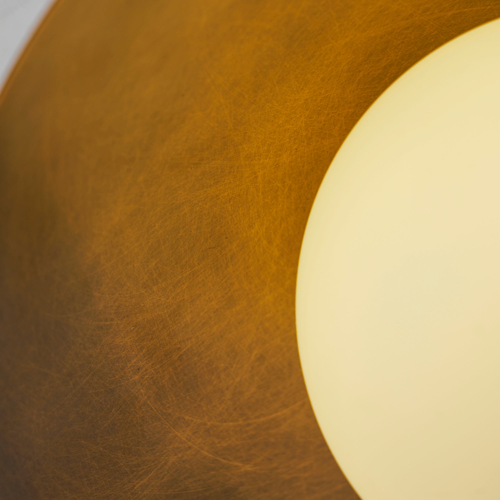 Close-up of the brass finish aging naturally.
