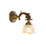 Darwin Wall Lamp with floral glass shade and antique brass finish.
