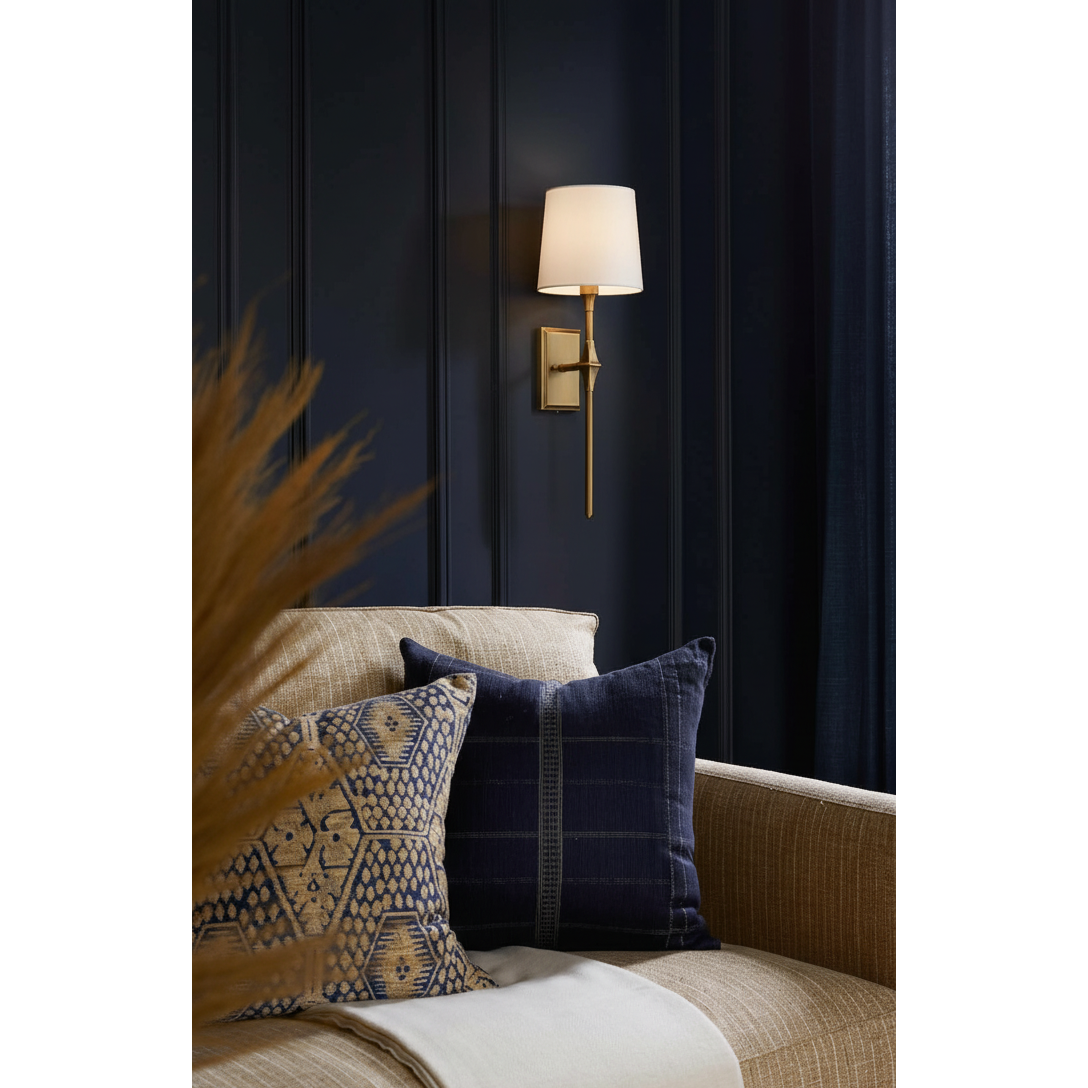 Lifestyle view of two Dauphine Wall Sconces flanking a fireplace mantel.