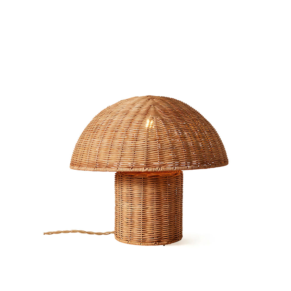 Aero Rattan Mushroom Table Lamp shown on a wooden surface.