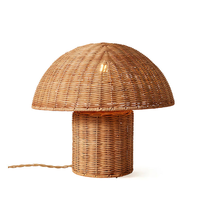 Unlit view of the Aero Rattan Mushroom Table Lamp against a white background.