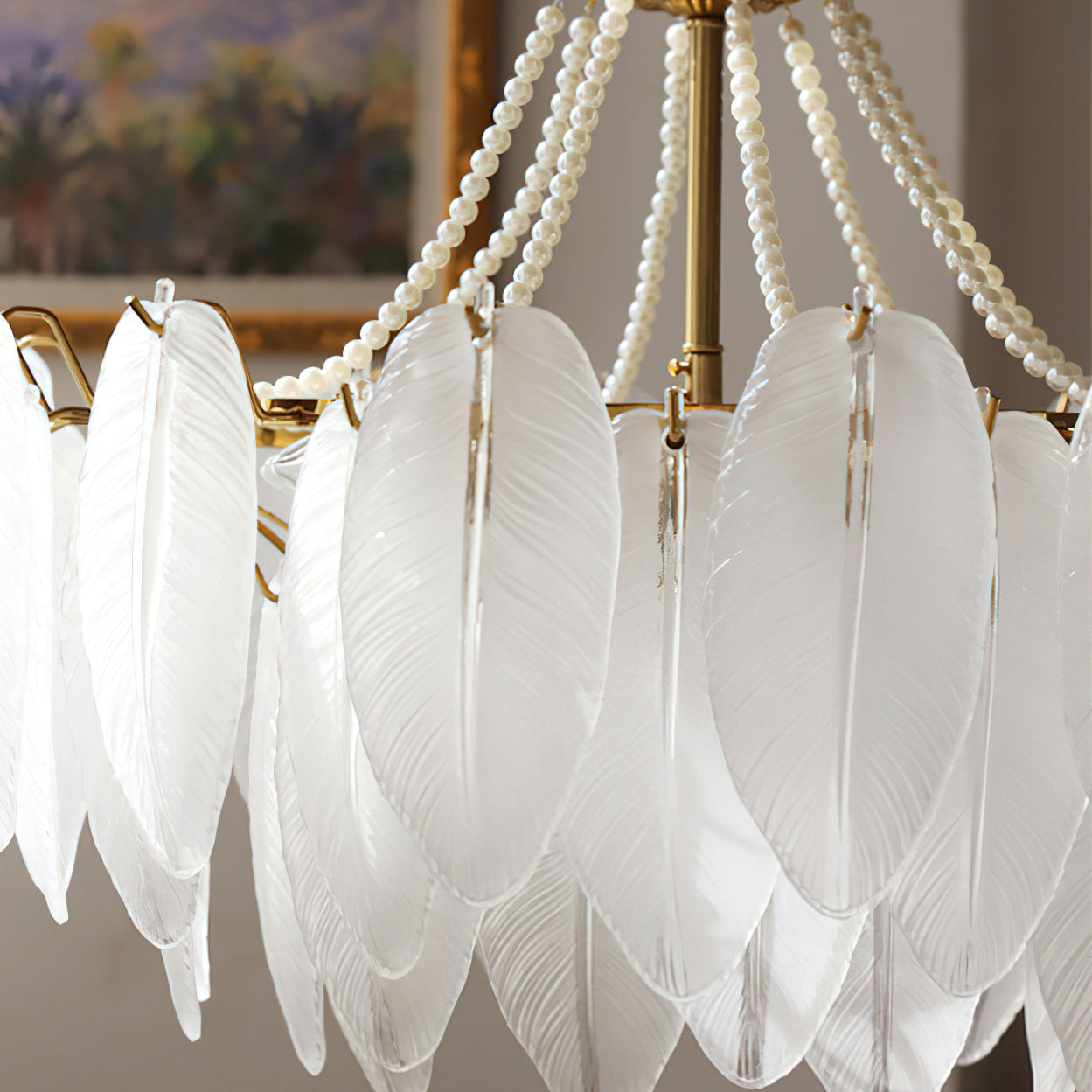 The warm light filtering through the semi-opaque white glass feathers.
