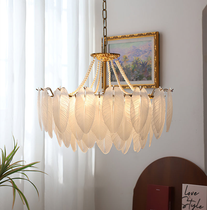 Close-up view of the intricately molded glass feathers on the Antheia Chandelier.