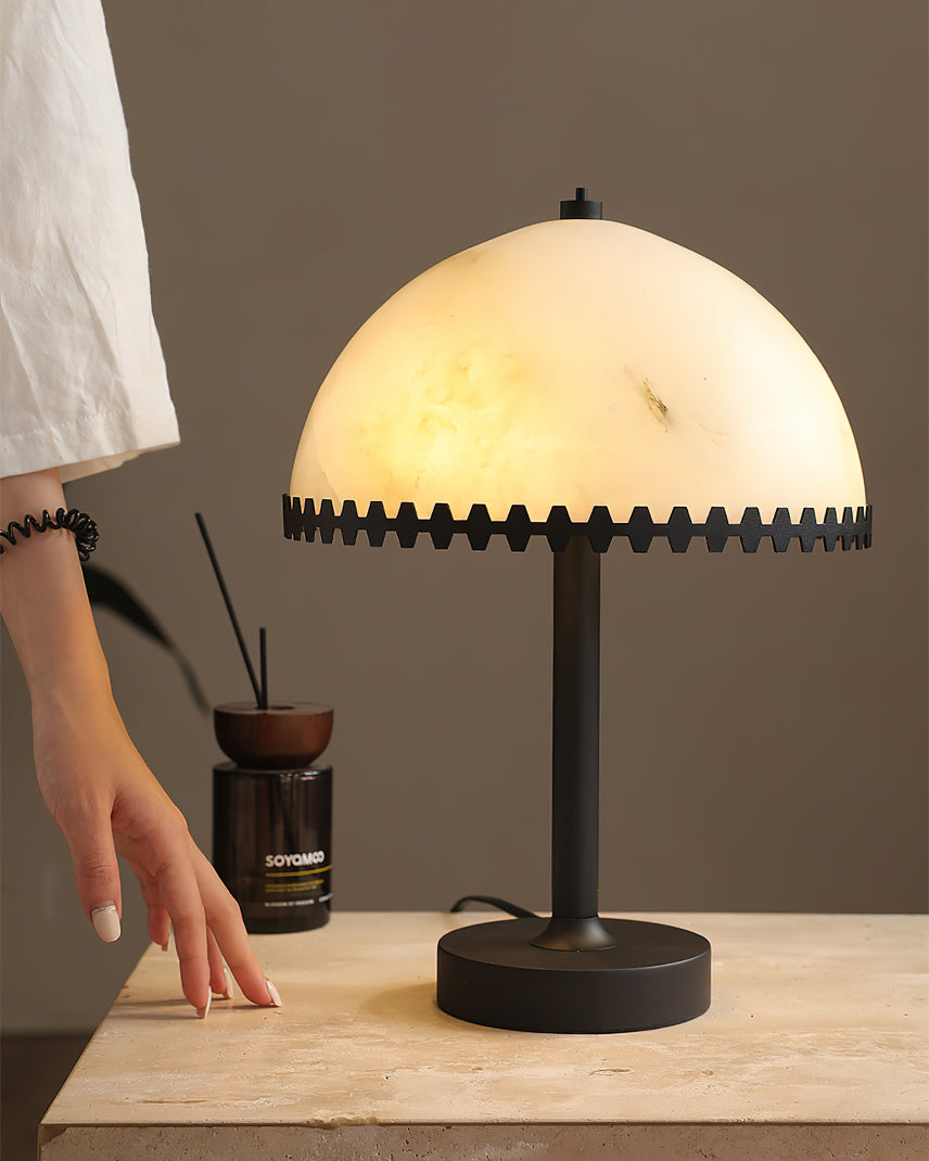 The G9 light source base inside the alabaster shade.