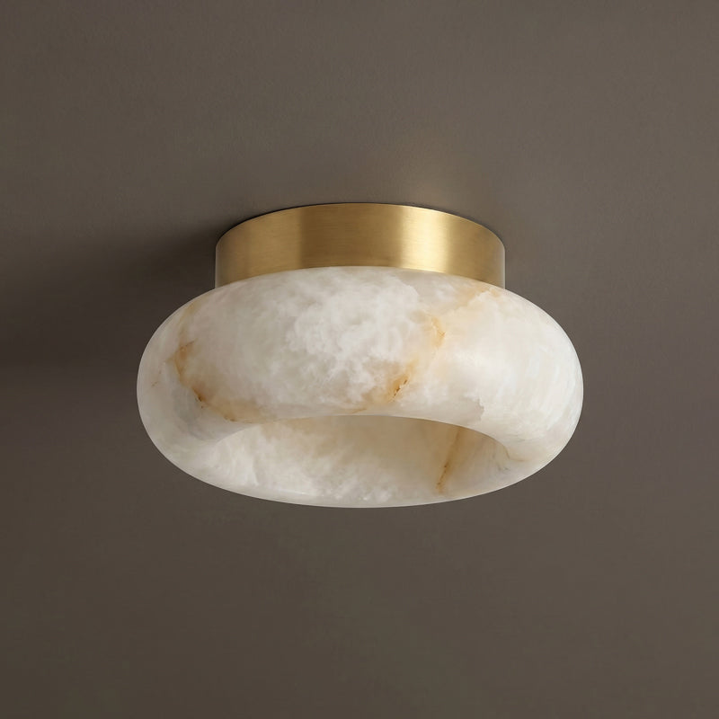 A view of the lamp from below, showing the diffused light through alabaster.