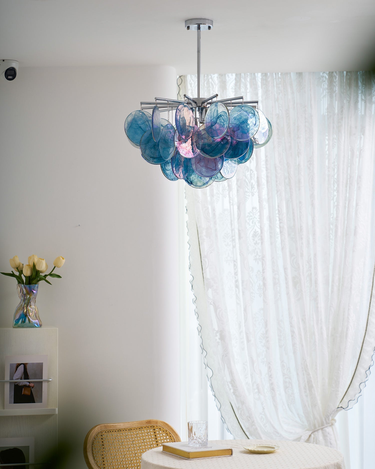 An artistic shot of the Camisa Glass Chandelier.