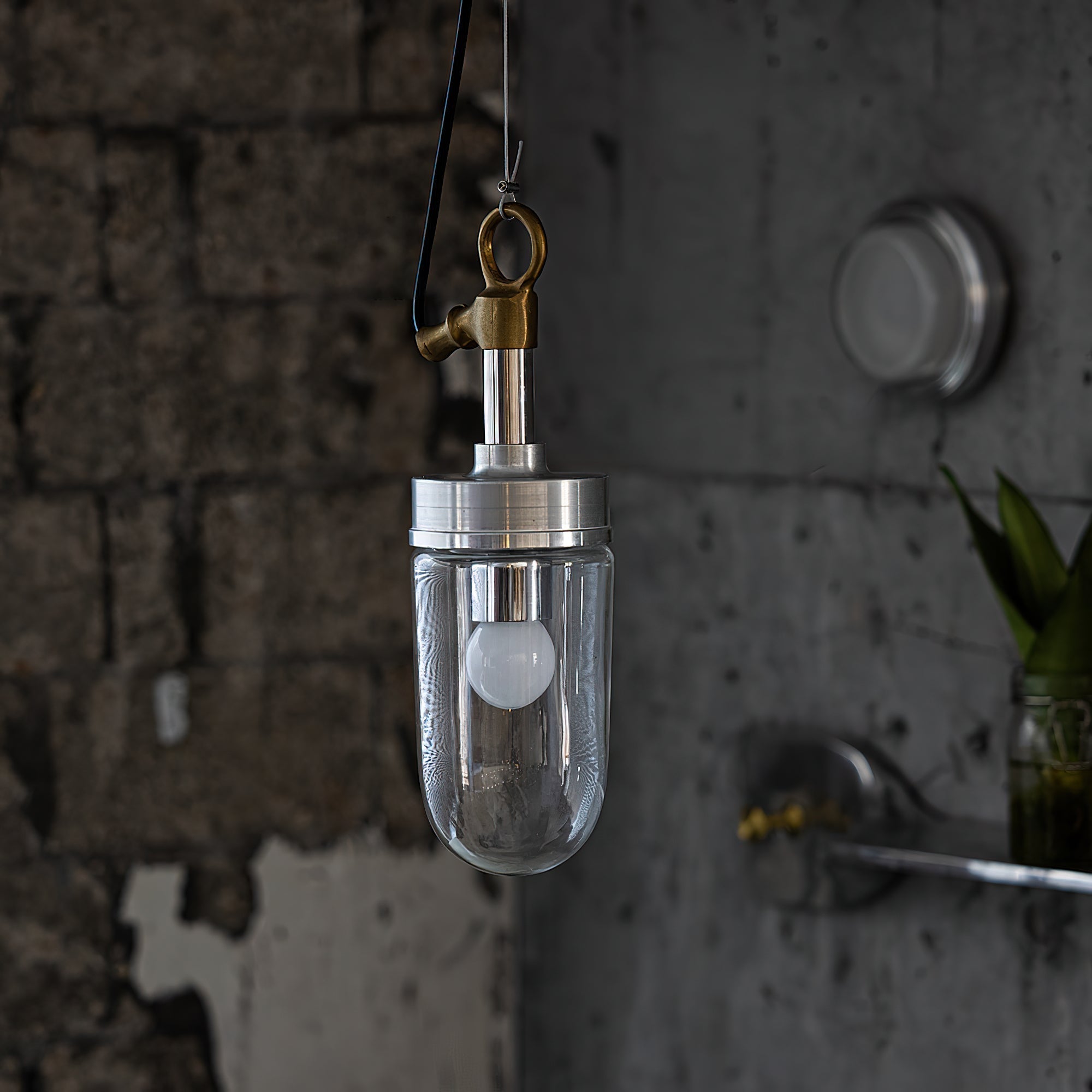 Angled view of the industrial-style Carson Capsule Pendant Light.