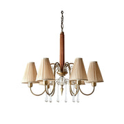 Front view of the Chateaux Crystal Chandelier with beige fabric shades.