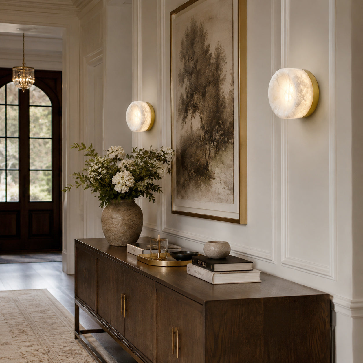 The wall sconce shown in a clean white finish.
