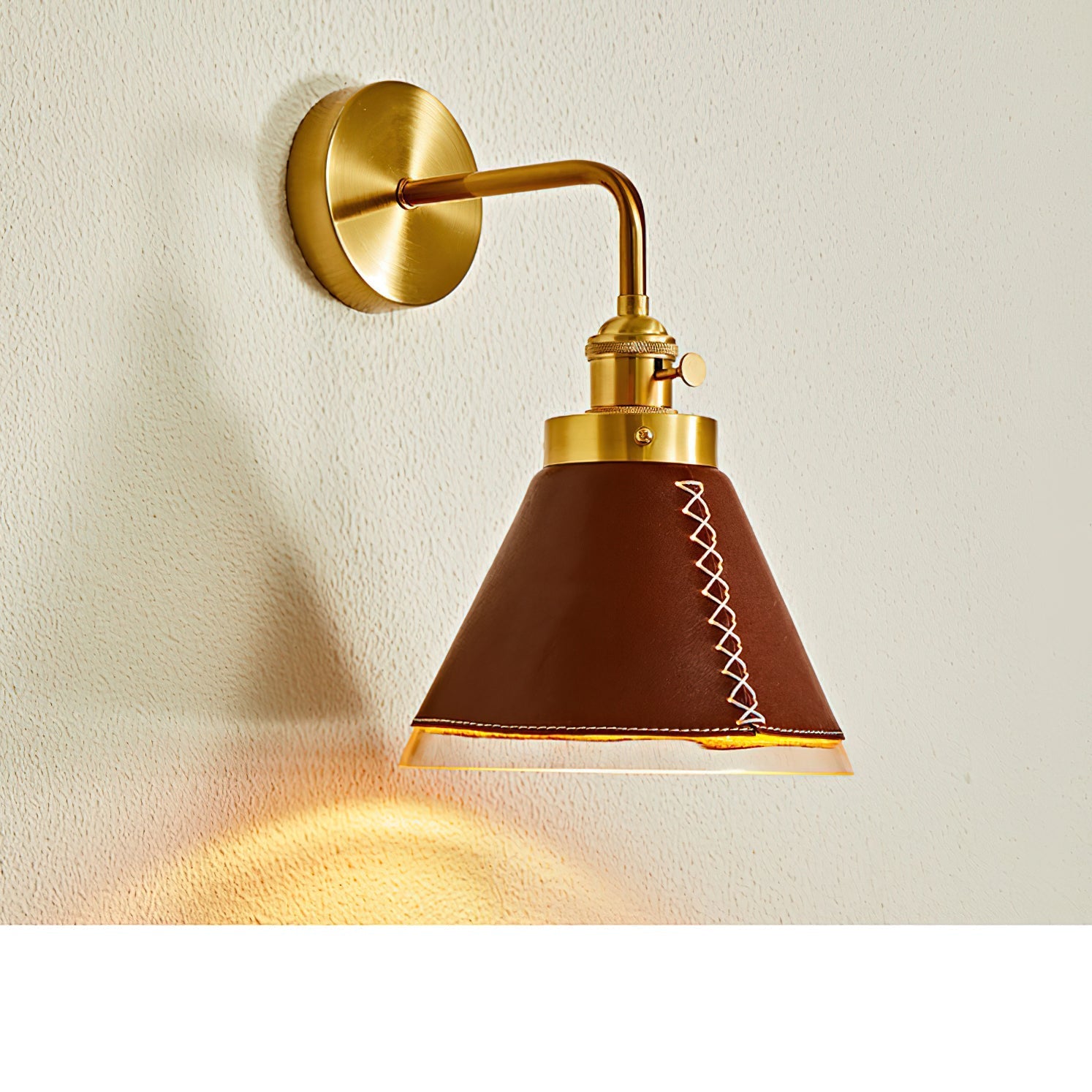 Lifestyle image of the sconce in a library alcove.