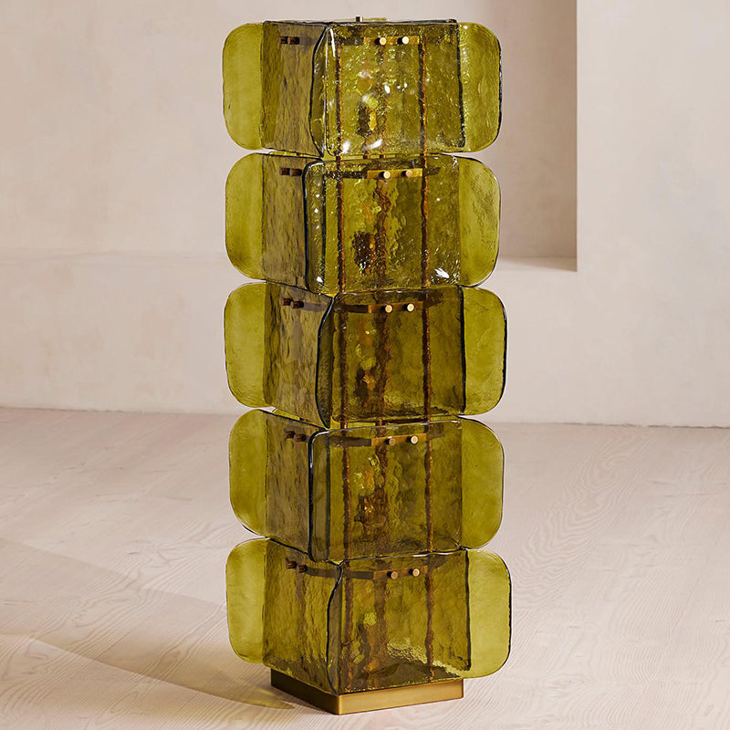 Angled view of the Cubo Totem Floor Lamp against a neutral wall.