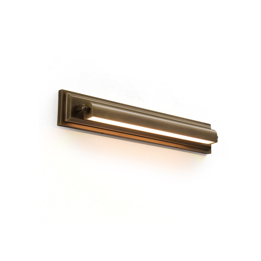 Davenport Tiered Wall Sconce in antique brass finish, shown horizontally mounted.
