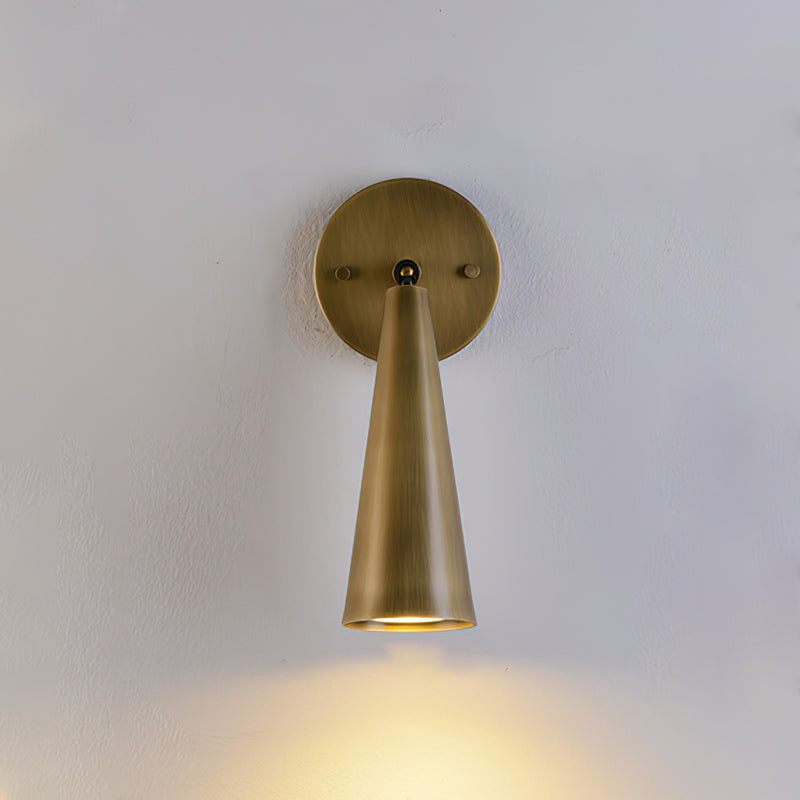 Angled view of the black sconce showing its profile.