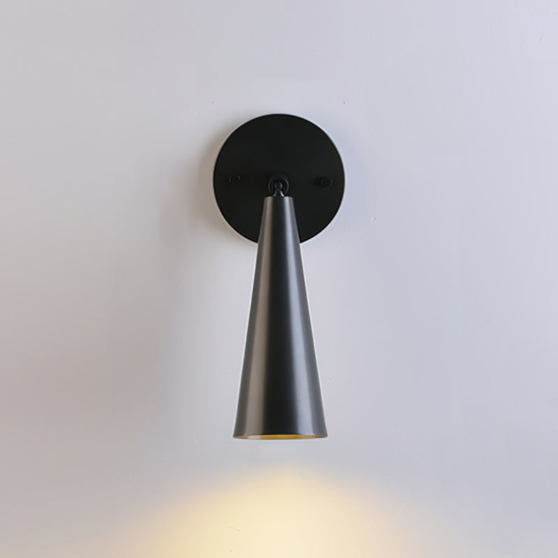 Angled view of the antique brass sconce.