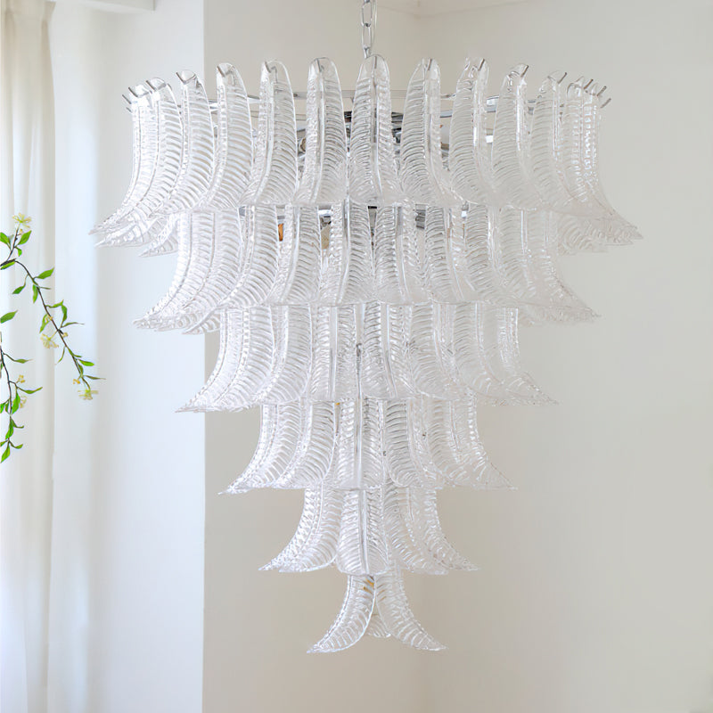 The chandelier turned on, showing diagonal light refraction.