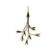 Evadne Brass Tulip Chandelier hanging in a modern dining room.