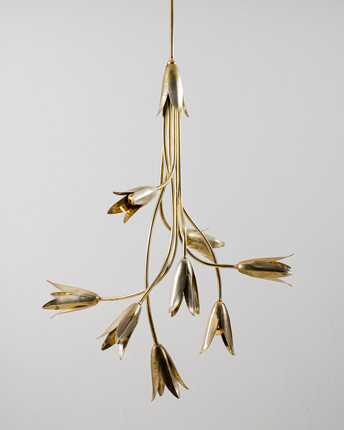 View of the chandelier from below, highlighting the cluster of lights.