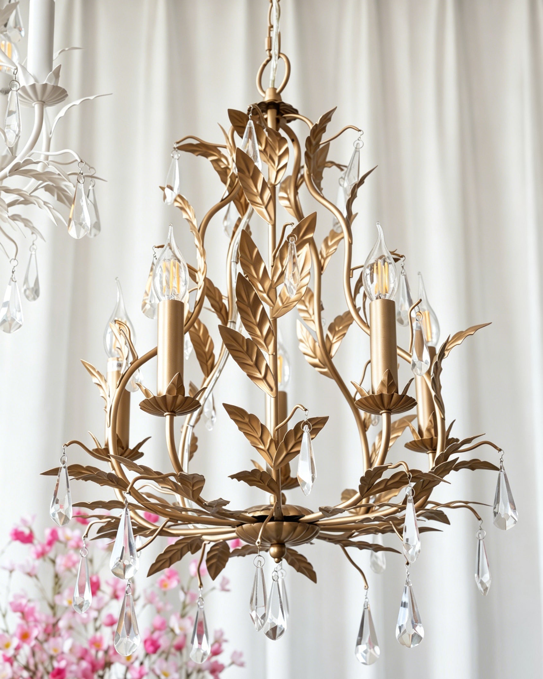Lifestyle image of the Evie Chandelier adding elegance to a room.