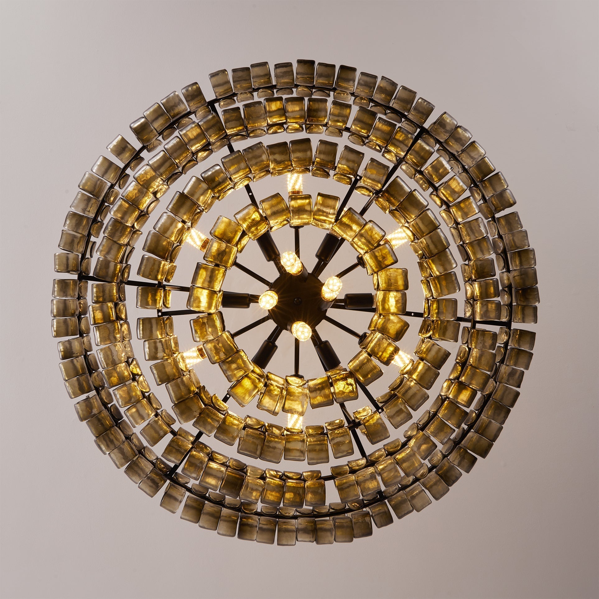 Close-up of light refracting through the textured glass tiles.