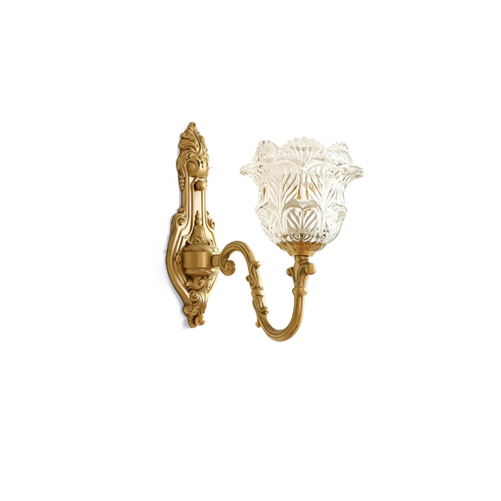 Gideon Baroque Brass Sconce with a tulip glass shade on a plain background.