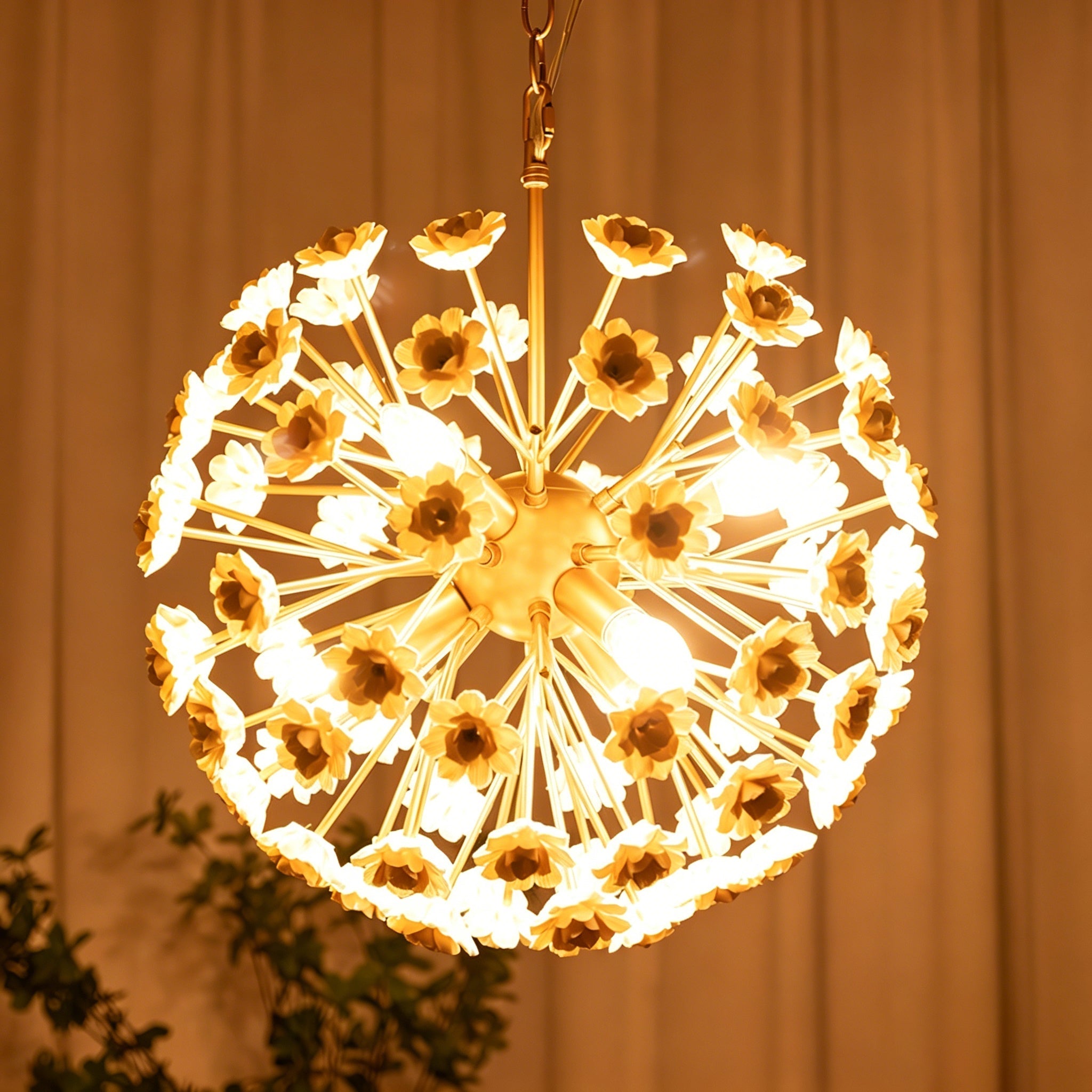 Gillian Chandelier illuminated, showing the warm glow from the candelabra sockets.