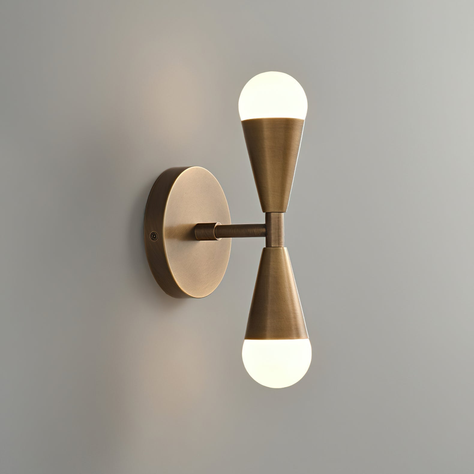 Harlan Gooseneck Sconce illuminated with a vintage-style Edison bulb.