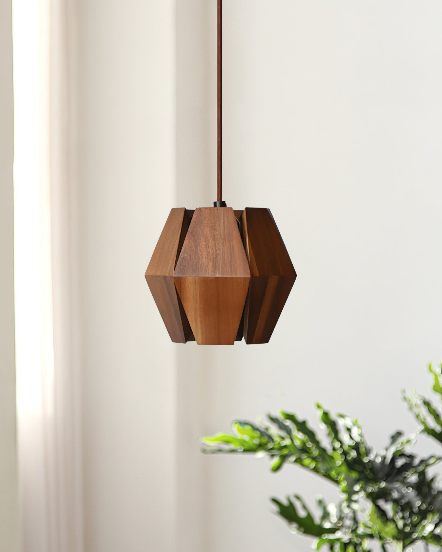 Close-up of the natural walnut wood grain on the Kaden Pendant Light's slats.