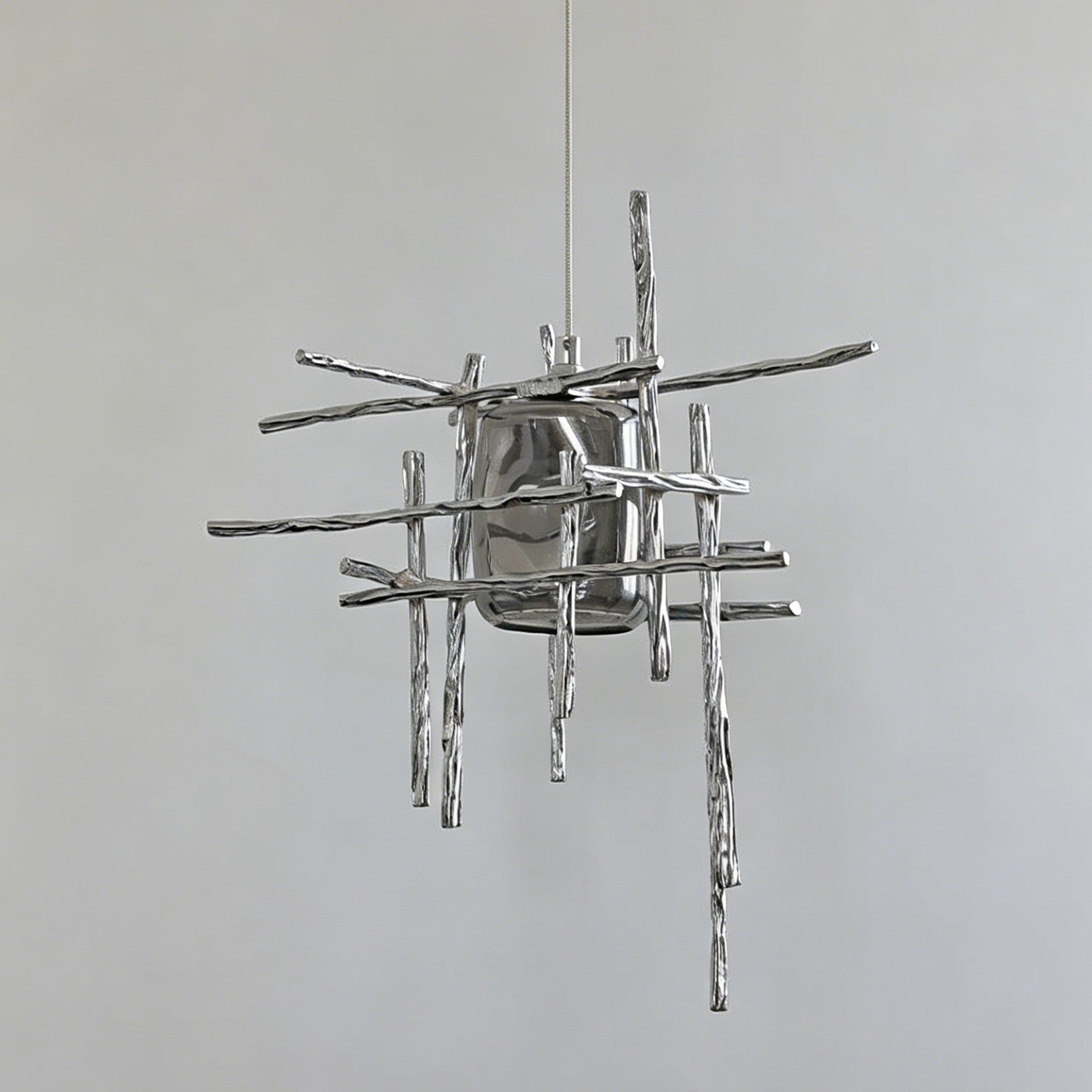 Kova Pendant Light shown in amber glass.