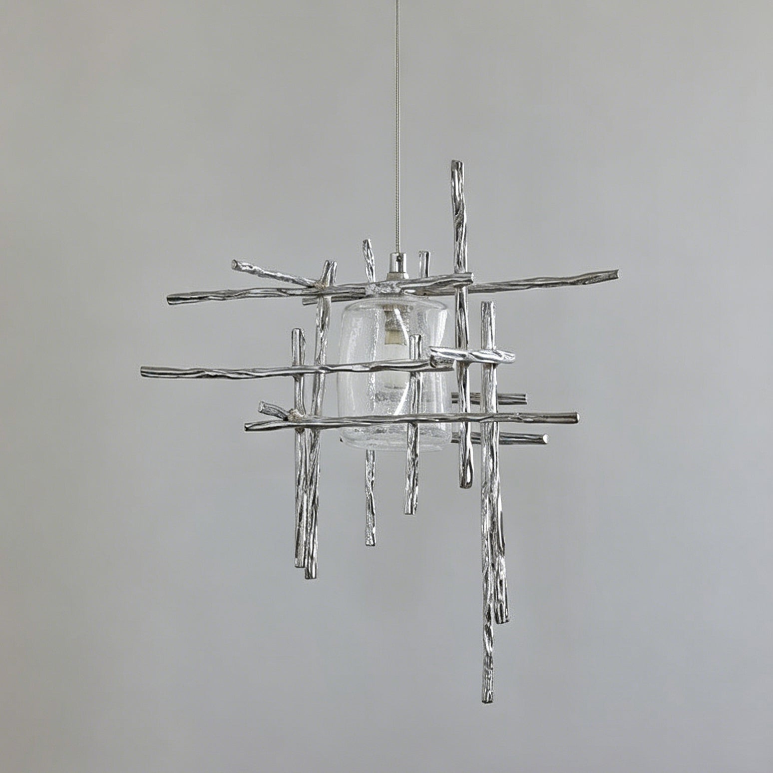 Kova Pendant Light shown in smoky gray glass.