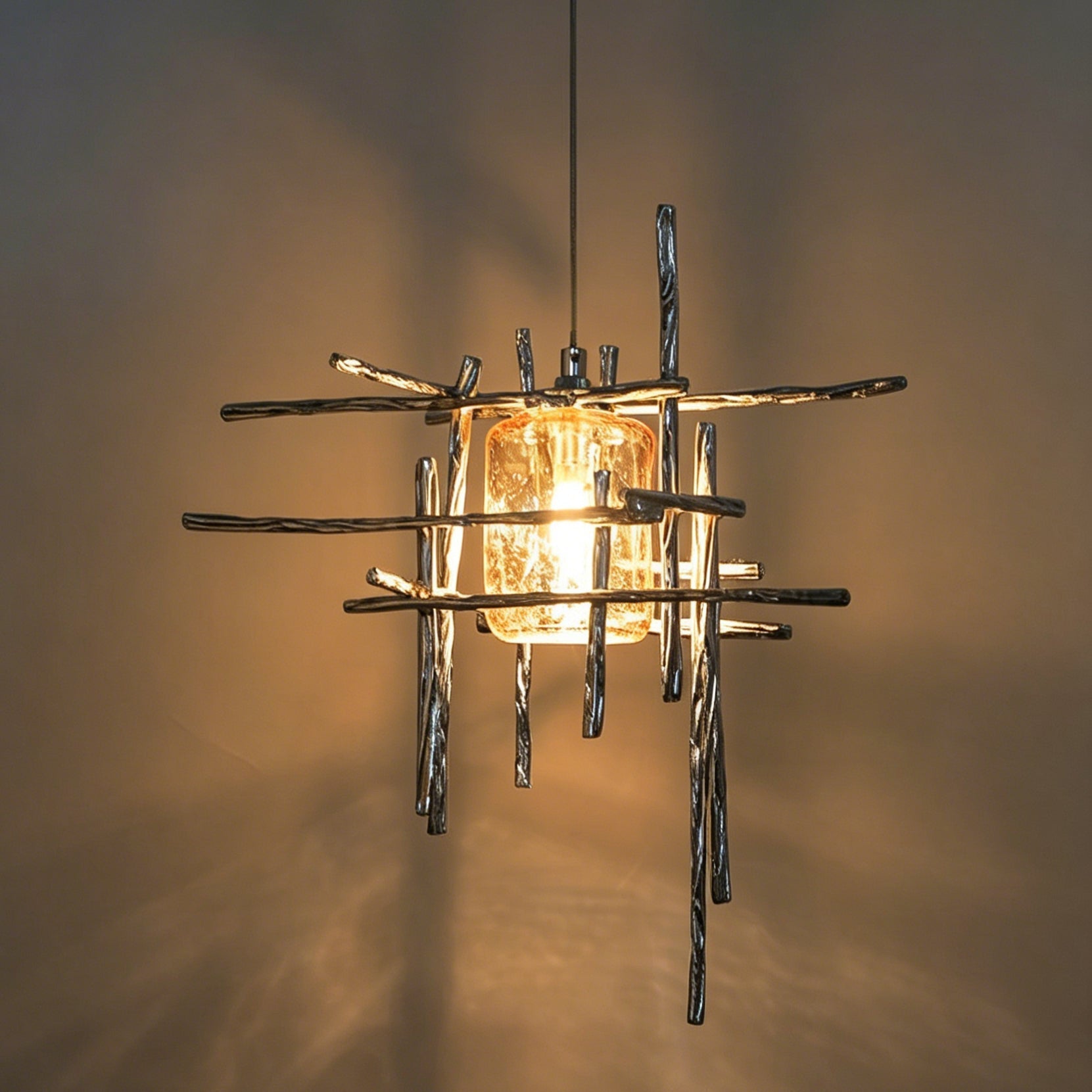 Kova Pendant Light shown in silver glass.