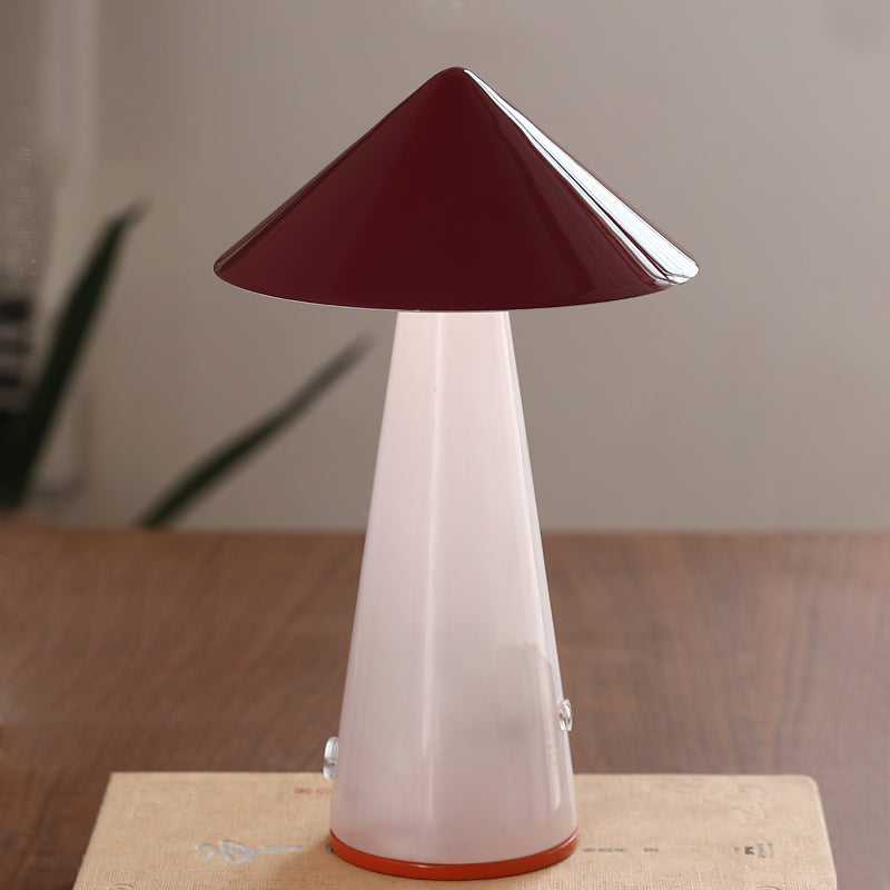 Detail shot of the push-button switch located on the base of the lamp.