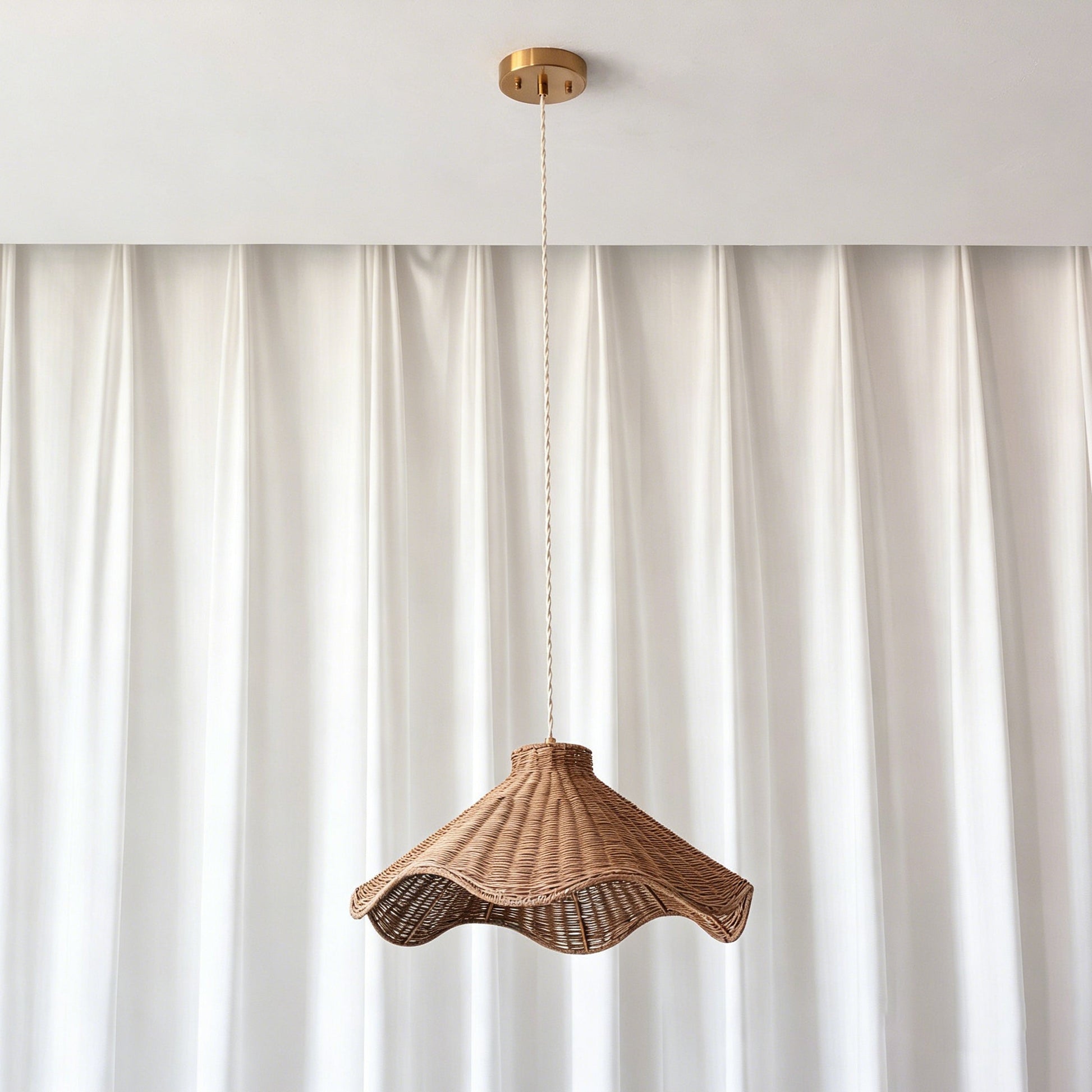The natural brown finish of the Maren rattan shade in detail.