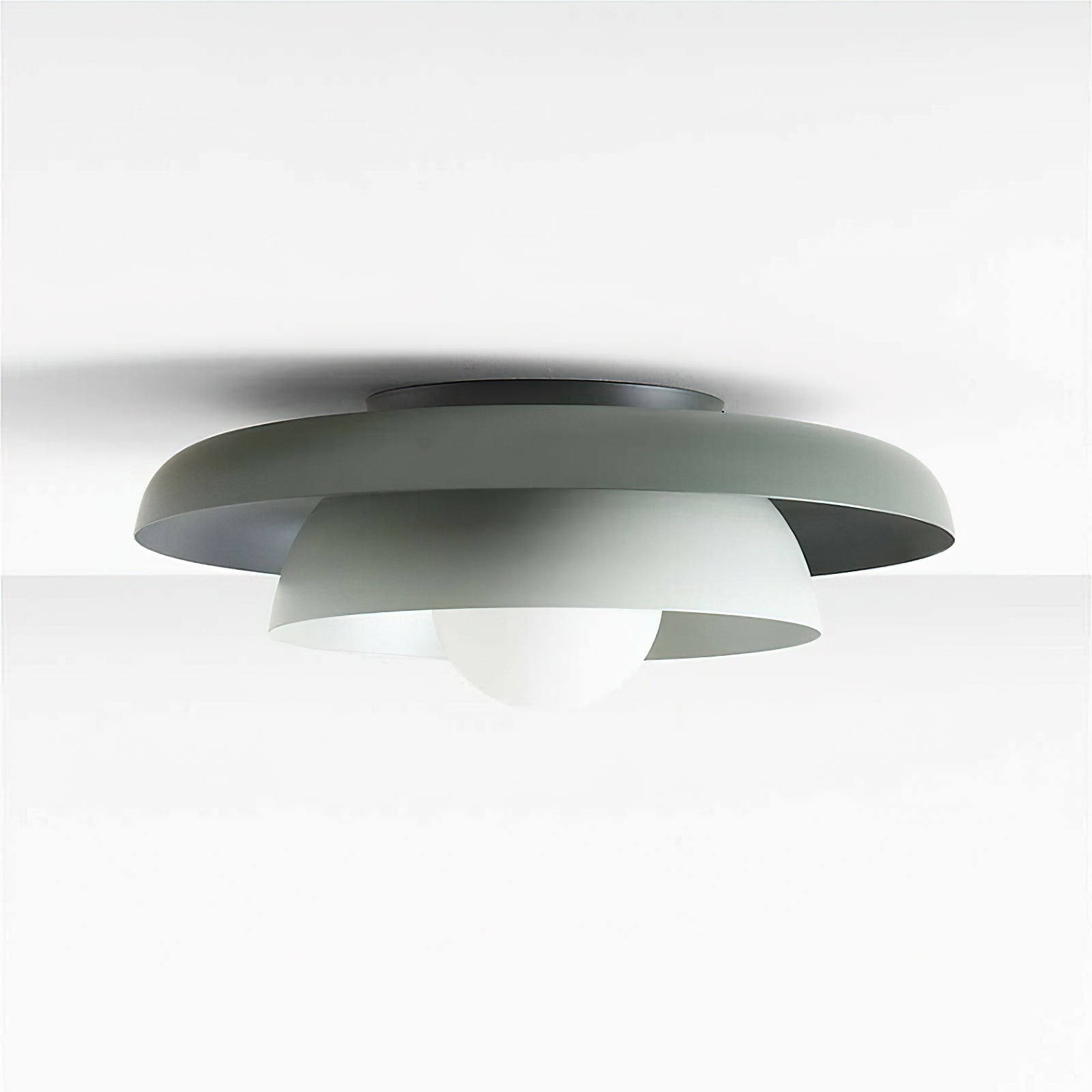 View of the flush mount from below, showing the two light sources.