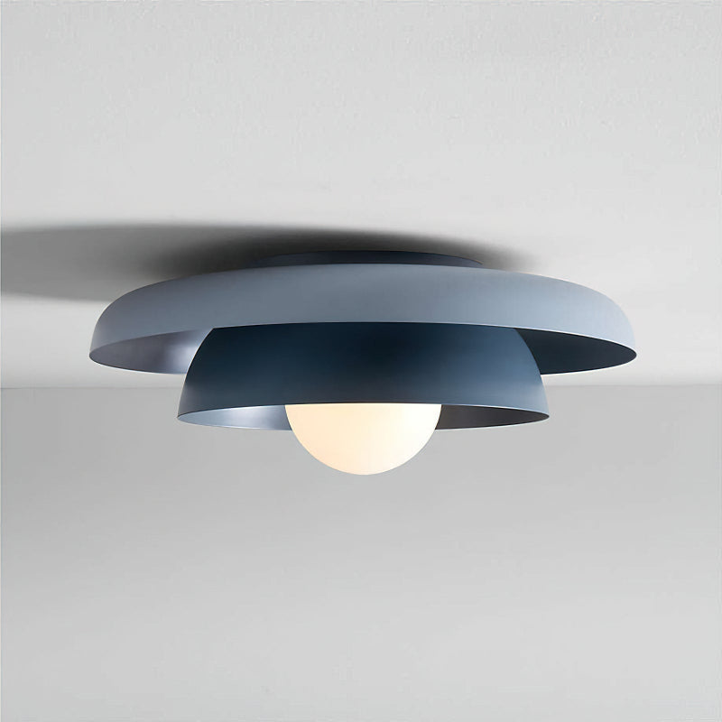 Angled view of the blue Miller Double Flush Mount against a neutral background.