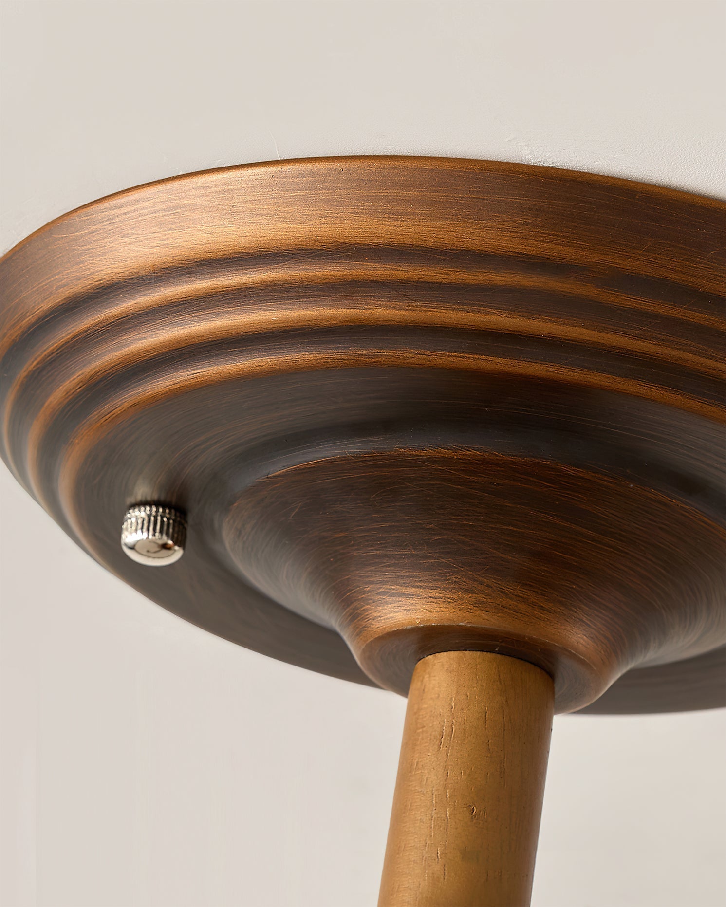 The smaller size (17.7 inch) of the Monterey Capiz Ceiling Mount for scale.